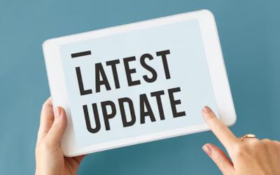 Billede af en Ipad med teksten "Latest Update".