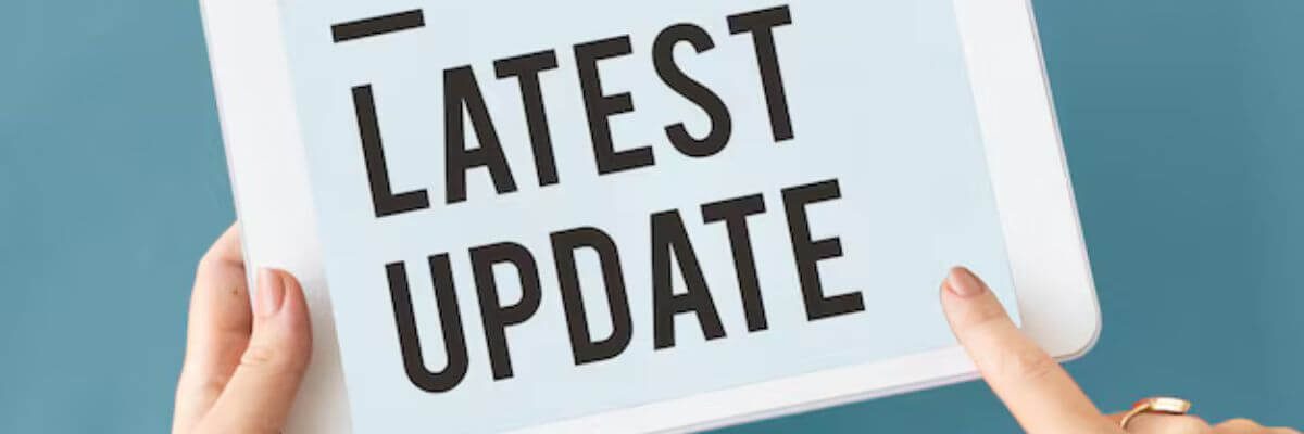 Billede af en Ipad med teksten "Latest Update".